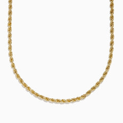 The 14K Yellow Gold 4mm Hollow Spiral Rope 22 Necklace is shown against a white background, highlighting its twisted, textured design and elegant length.