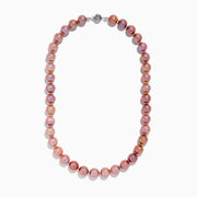 The 14K White Gold Lilac Fresh Water Pearl Necklace features round, shiny lilac pearls in a single strand with a 14K white gold clasp, displayed on a white background.