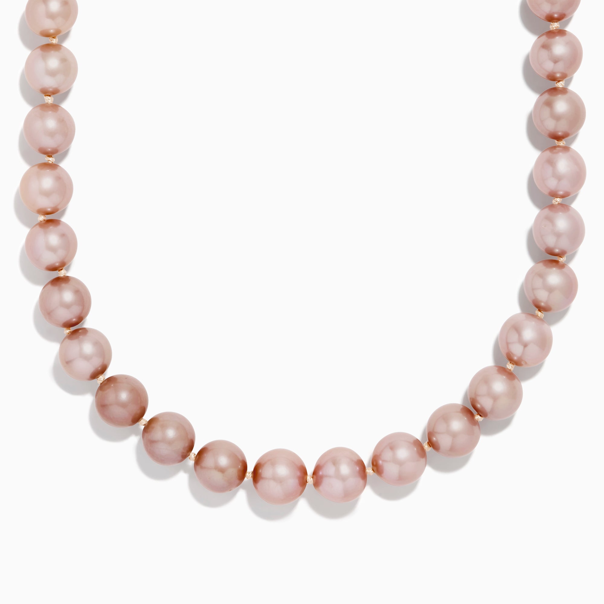 A close-up of the 14K Yellow Gold Freshwater Lilac Pearl Necklace highlights its round, glossy lilac pearls elegantly strung together in a gentle curve against a white background.
