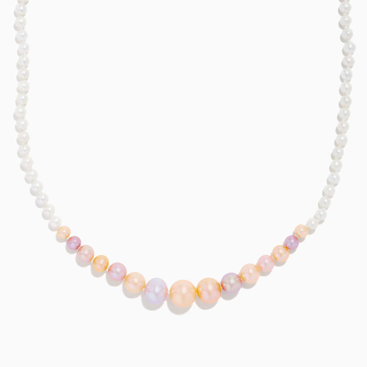 The 14K Yellow Gold Multi Color Freshwater Pearl Necklace features small white pearls graduating to larger pastel pink, peach, and lavender pearls at the center, all elegantly strung on 14K yellow gold.