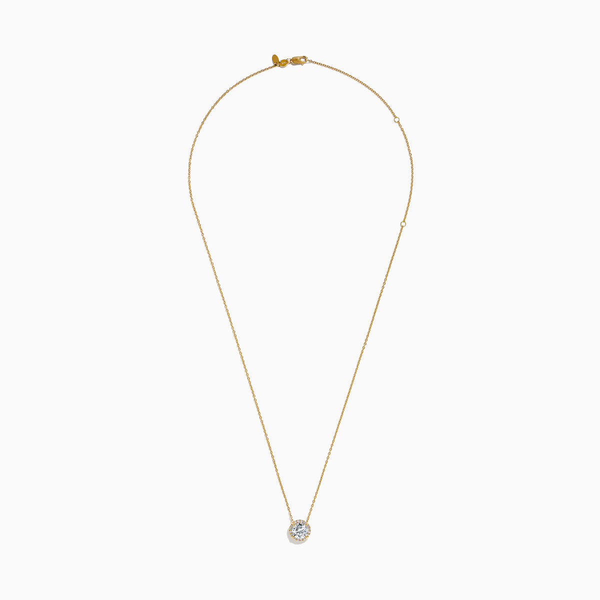 The Star Lab Grown Diamond Halo Pendant in 18K Yellow Gold features a round brilliant lab diamond surrounded by smaller diamonds on a gold chain, displayed against a plain white background.