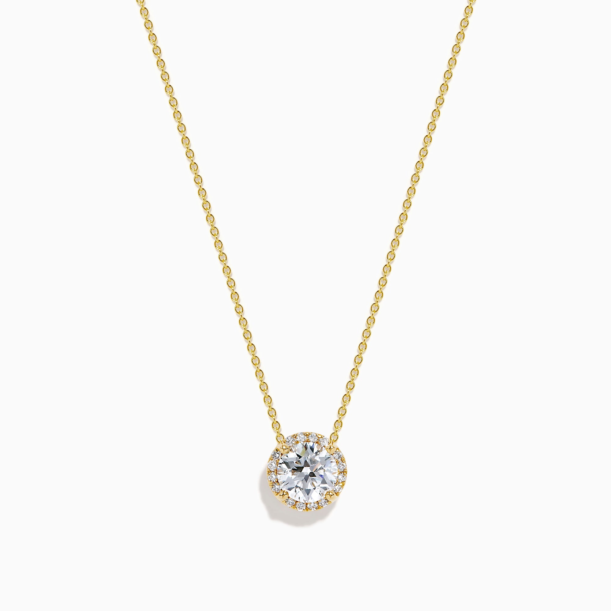 The Star Lab Grown Diamond Halo Pendant in 18K Yellow Gold features a round brilliant lab diamond surrounded by smaller diamonds on a gold chain, displayed against a plain white background.