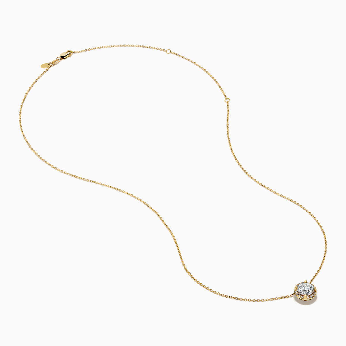 The Star Lab Grown Diamond Halo Pendant in 18K Yellow Gold features a round brilliant lab diamond surrounded by smaller diamonds on a gold chain, displayed against a plain white background.