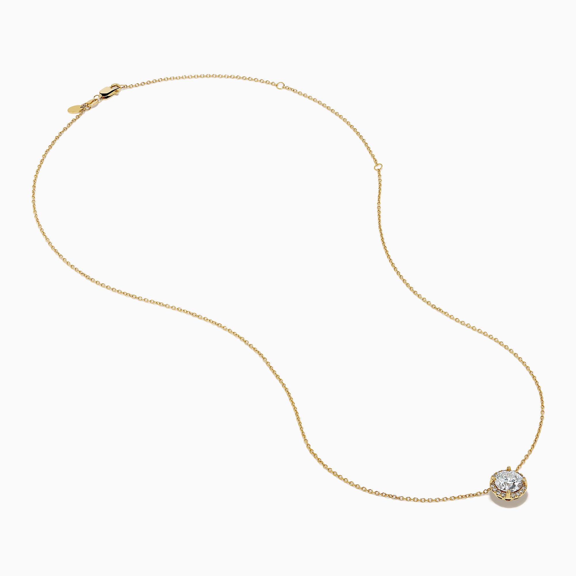 The Star Lab Grown Diamond Halo Pendant in 18K Yellow Gold features a round brilliant lab diamond surrounded by smaller diamonds on a gold chain, displayed against a plain white background.
