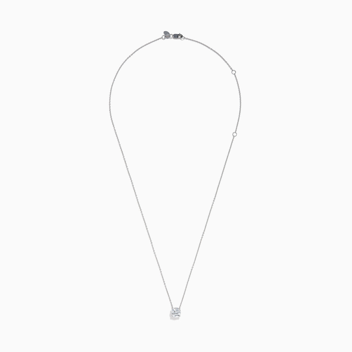 The Star Lab Grown Diamond Solitaire Pendant in 18K White Gold features a single round diamond on a delicate chain, showcased against a plain white background.