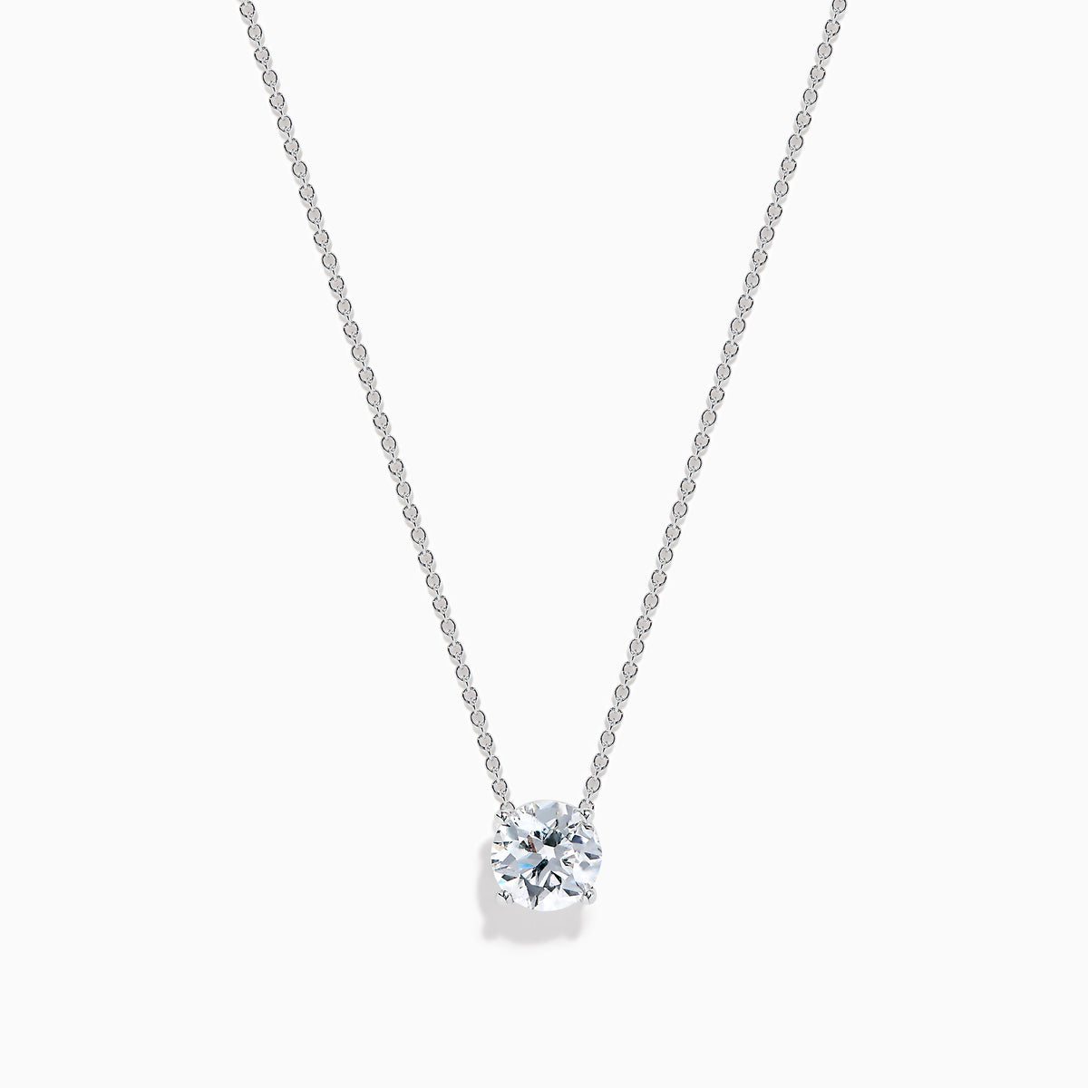 The Star Lab Grown Diamond Solitaire Pendant in 18K White Gold features a single round diamond on a delicate chain, showcased against a plain white background.