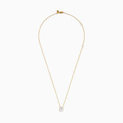 The Star Lab Grown Diamond Solitaire Pendant in 18K yellow gold features a fine chain with a single round lab diamond at the center.