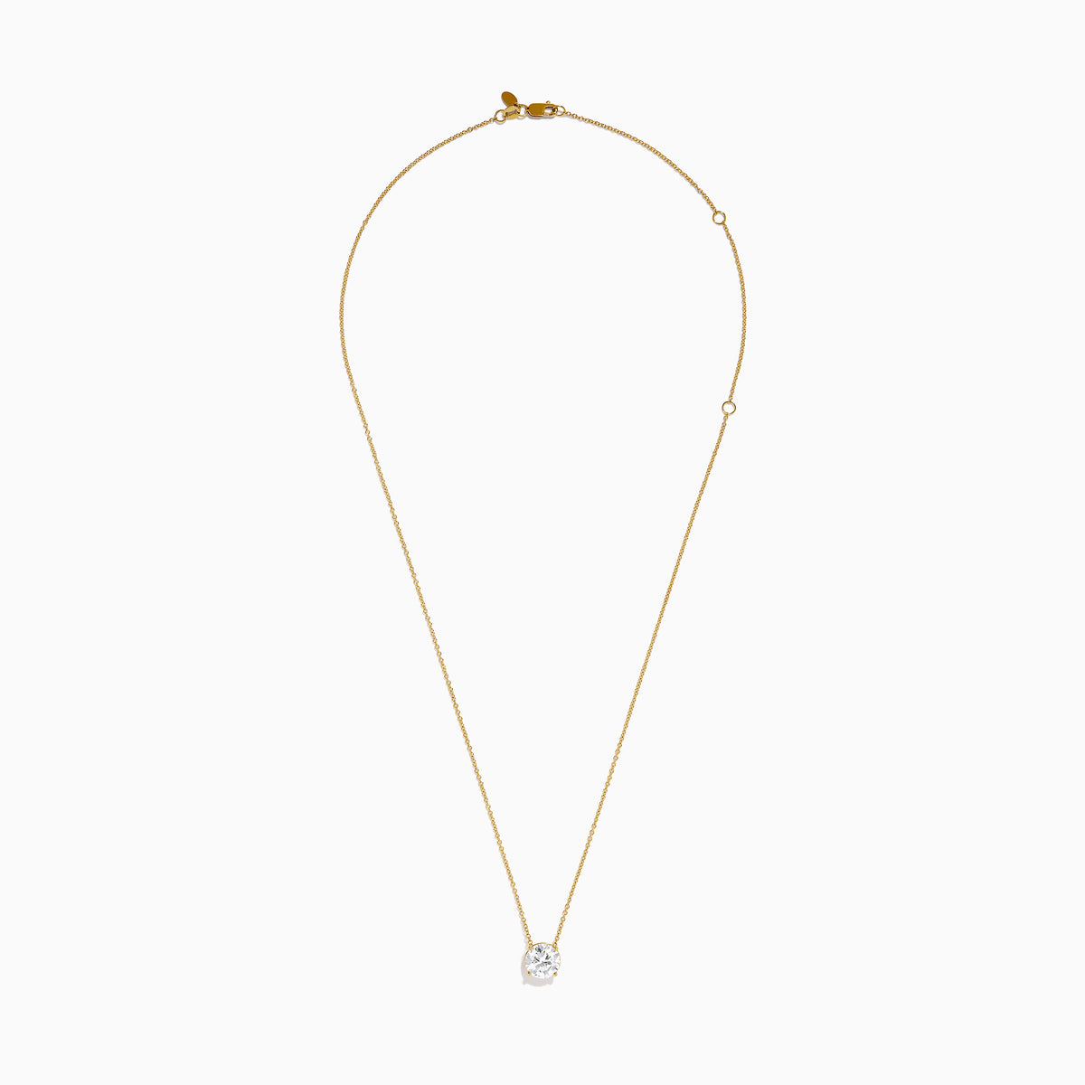 The Star Lab Grown Diamond Solitaire Pendant in 18K yellow gold features a fine chain with a single round lab diamond at the center.