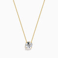 The Star Lab Grown Diamond Solitaire Pendant in 18K yellow gold features a fine chain with a single round lab diamond at the center.