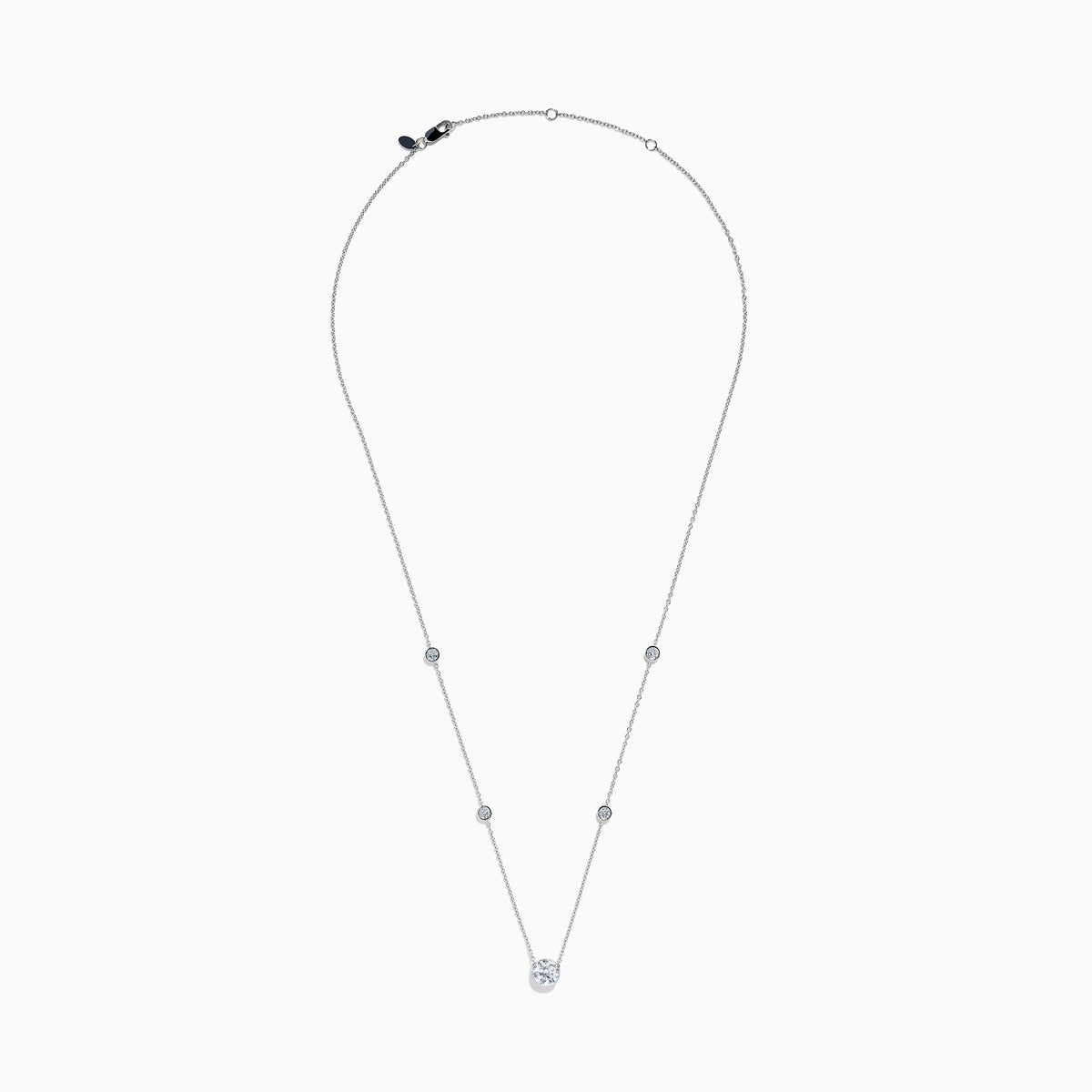 The Star Lab Grown Diamond Necklace in 18K White Gold features three round bezel-set lab diamonds spaced along a silver-like chain, with the largest diamond centered at the bottom for an elegant look.