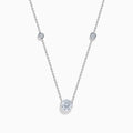 The Star Lab Grown Diamond Necklace in 18K White Gold features three round bezel-set lab diamonds spaced along a silver-like chain, with the largest diamond centered at the bottom for an elegant look.