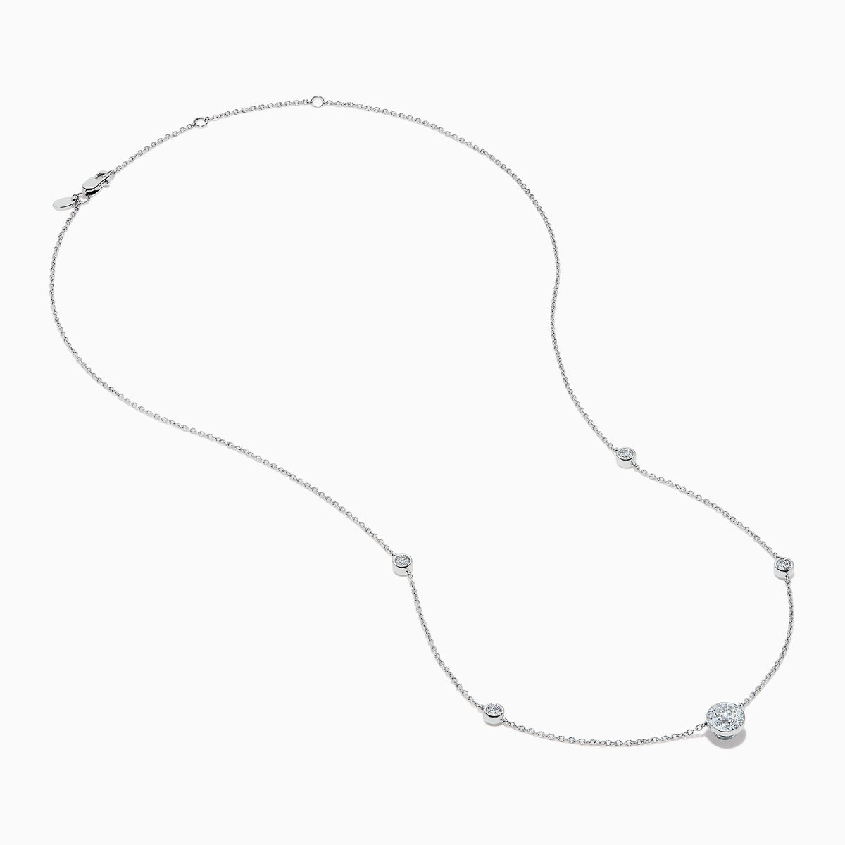 The Star Lab Grown Diamond Necklace in 18K White Gold features three round bezel-set lab diamonds spaced along a silver-like chain, with the largest diamond centered at the bottom for an elegant look.