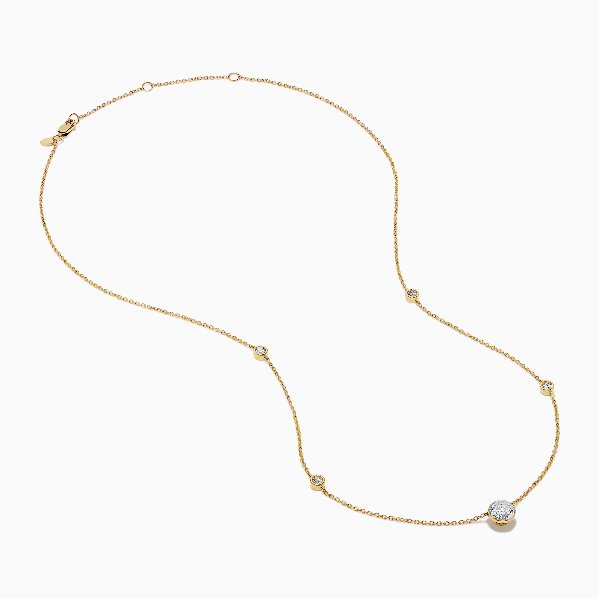 The Star Lab Grown Diamond Necklace in 18K Yellow Gold features a delicate chain with three round, bezel-set diamonds—a larger center diamond and two smaller diamonds evenly spaced along the chain.