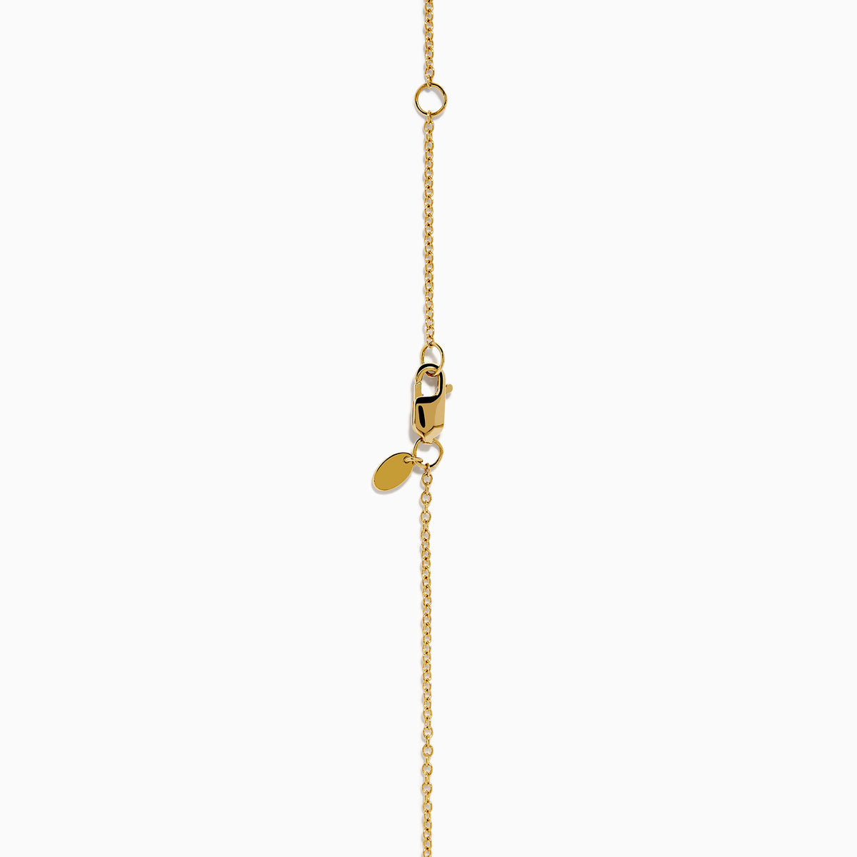 The Star Lab Grown Diamond Necklace in 18K Yellow Gold features a delicate chain with three round, bezel-set diamonds—a larger center diamond and two smaller diamonds evenly spaced along the chain.