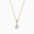 The Star Lab Grown Diamond Classic Station Necklace in 18K yellow gold features a vertical baguette-cut stone, a small round diamond, and a larger round brilliant-cut gemstone pendant.