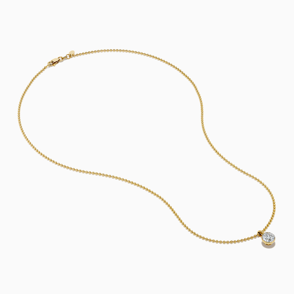 The Star Lab Grown Diamond Solitaire Beaded Pendant in 18K Yellow Gold features a delicate beaded chain and a round diamond solitaire, beautifully displayed on a white background.