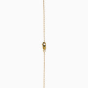 14K Yellow Gold Diamond Accented Interlocking Hearts Necklace featuring two entwined hearts—one with sparkling diamonds, the other polished smooth—shown on a plain white background.