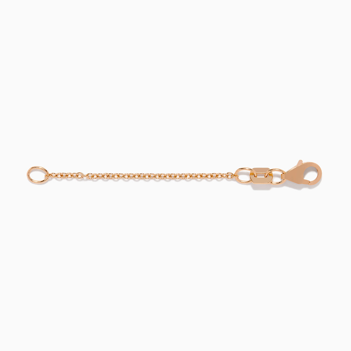 The 14K Rose Gold 1.2mm 2-Inch Cable Chain Extension features a small round link on one end and a lobster clasp on the other, shown against a white background.