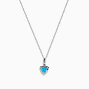 A 925 Sterling Silver Blue Topaz and Diamond Pendant, featuring a triangular blue topaz surrounded by sparkling diamonds, displayed on a white background.