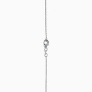 A 925 Sterling Silver Blue Topaz and Diamond Pendant, featuring a triangular blue topaz surrounded by sparkling diamonds, displayed on a white background.