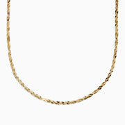 The 14 Karat Yellow Gold Cleo Link Necklace, showcasing a shiny, textured surface and elegant chain design, is displayed against a plain white background.