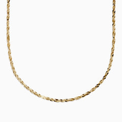 The 14 Karat Yellow Gold Cleo Link Necklace, showcasing a shiny, textured surface and elegant chain design, is displayed against a plain white background.