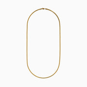 The Men's 14K Yellow Gold Hollow Franco Necklace features an intricate pattern and polished finish, forming a wide U-shape against a white background.