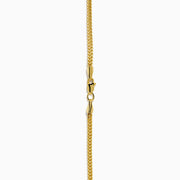 The Men's 14K Yellow Gold Hollow Franco Necklace features an intricate pattern and polished finish, forming a wide U-shape against a white background.