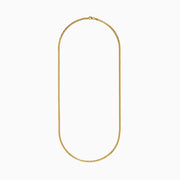 The 14K Yellow Gold 2.7mm Solid Oval Curb 24 Chain features a smooth, polished finish and is shown against a white background.