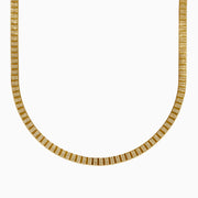 The 14K Yellow Gold Textured Herringbone Chain Necklace 17 features a flat, smooth, and wide U-shaped design displayed against a white background.