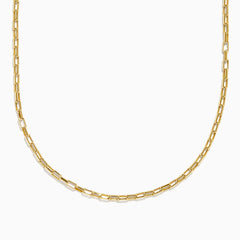 The 14K Yellow Gold Hollow Rectangle Link Necklace features delicate, elongated rectangular links and is shown curved gently against a white background, emphasizing its simple, elegant design.