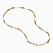 The 14K Yellow Gold Oval Paperclip Chain features alternating small oval and elongated bar links, shown on a white background.