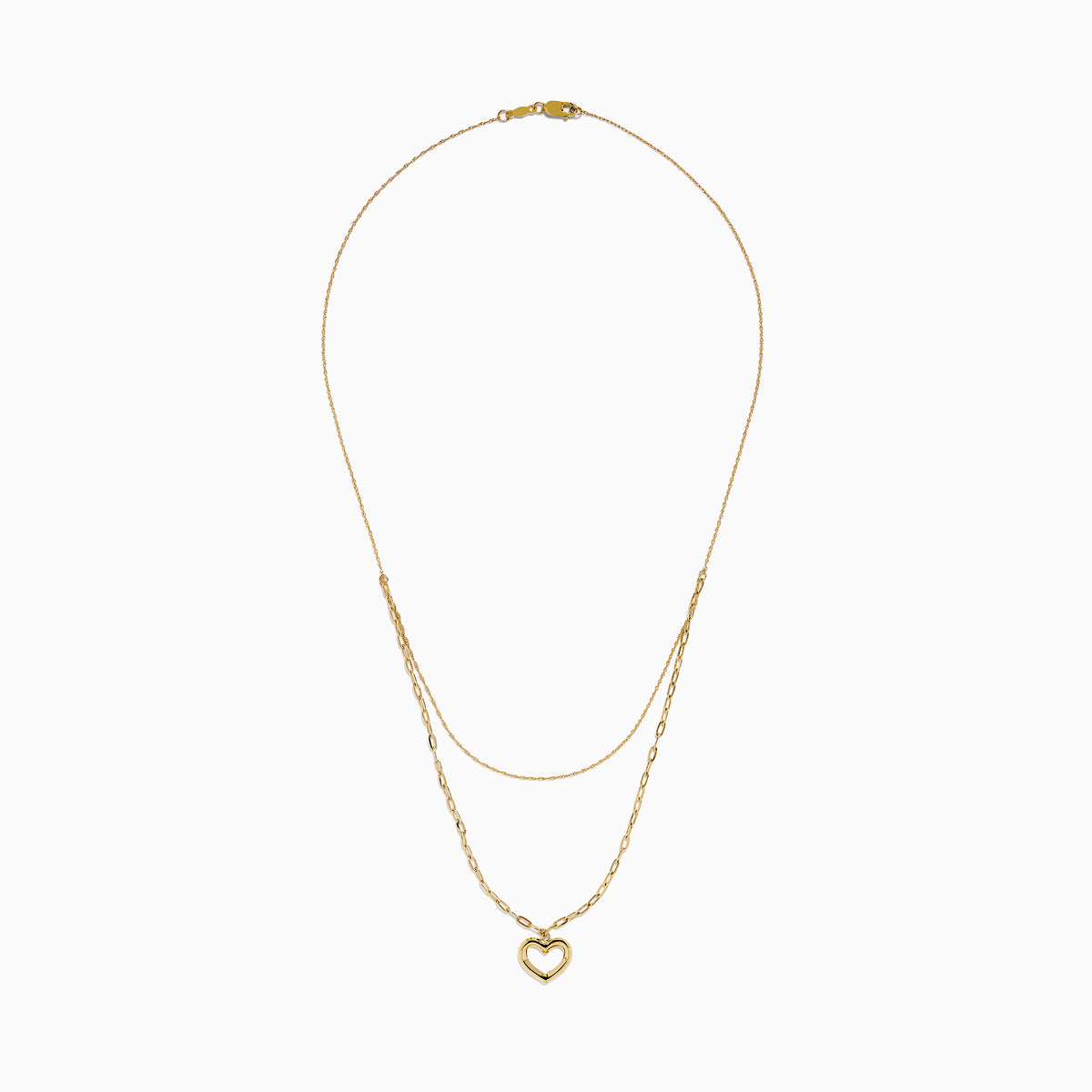 Two gold necklaces are shown: a delicate 14K yellow gold chain and the 14K Yellow Gold Stamp Heart Layered Paperclip Necklace, which features larger links and a heart-shaped pendant. Both pieces are displayed on a plain white background.