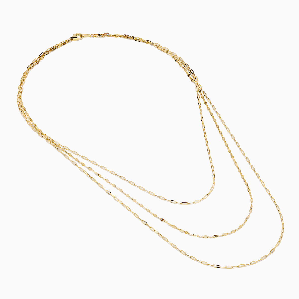 The 14K Yellow Gold Layered Chain Necklace features three delicate chains of different lengths with evenly spaced links, displayed on a white background—a perfect set for achieving effortless elegance.