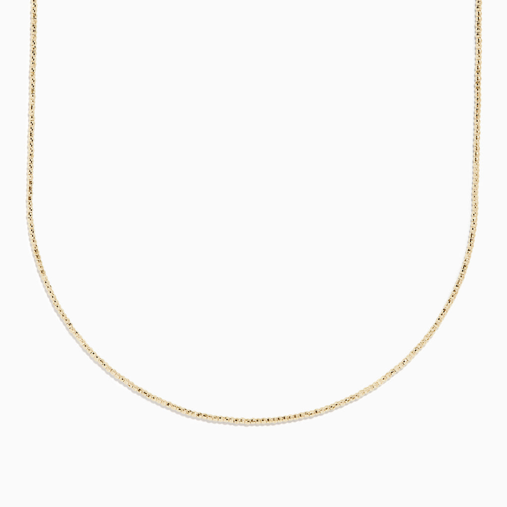 The 14K Yellow Gold Bead Necklace is a thin, delicate chain displayed against a plain white background.