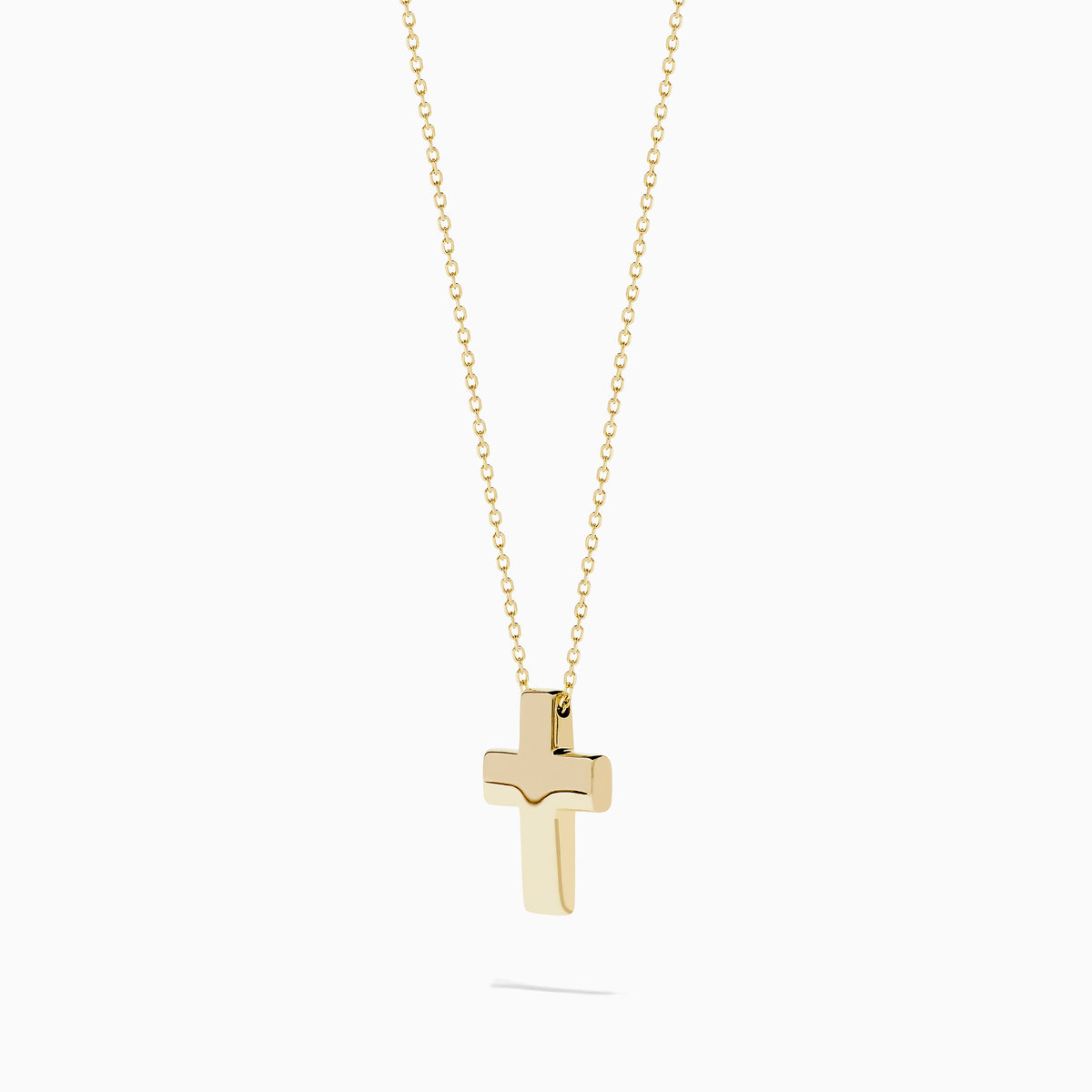 The 14K Yellow Gold Cross Pendant is a polished cross pendant necklace displayed on a plain white background.