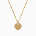 The 14K Yellow Gold Heart on a Paperclip Chain Necklace features an elongated chain and a flat heart pendant, elegantly displayed on a white background.