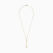 The 14K Yellow Gold Lariat Box Chain Necklace showcases a box-shaped slider at the center and two slender rectangular pendants on adjustable chains, all set against a plain white background.