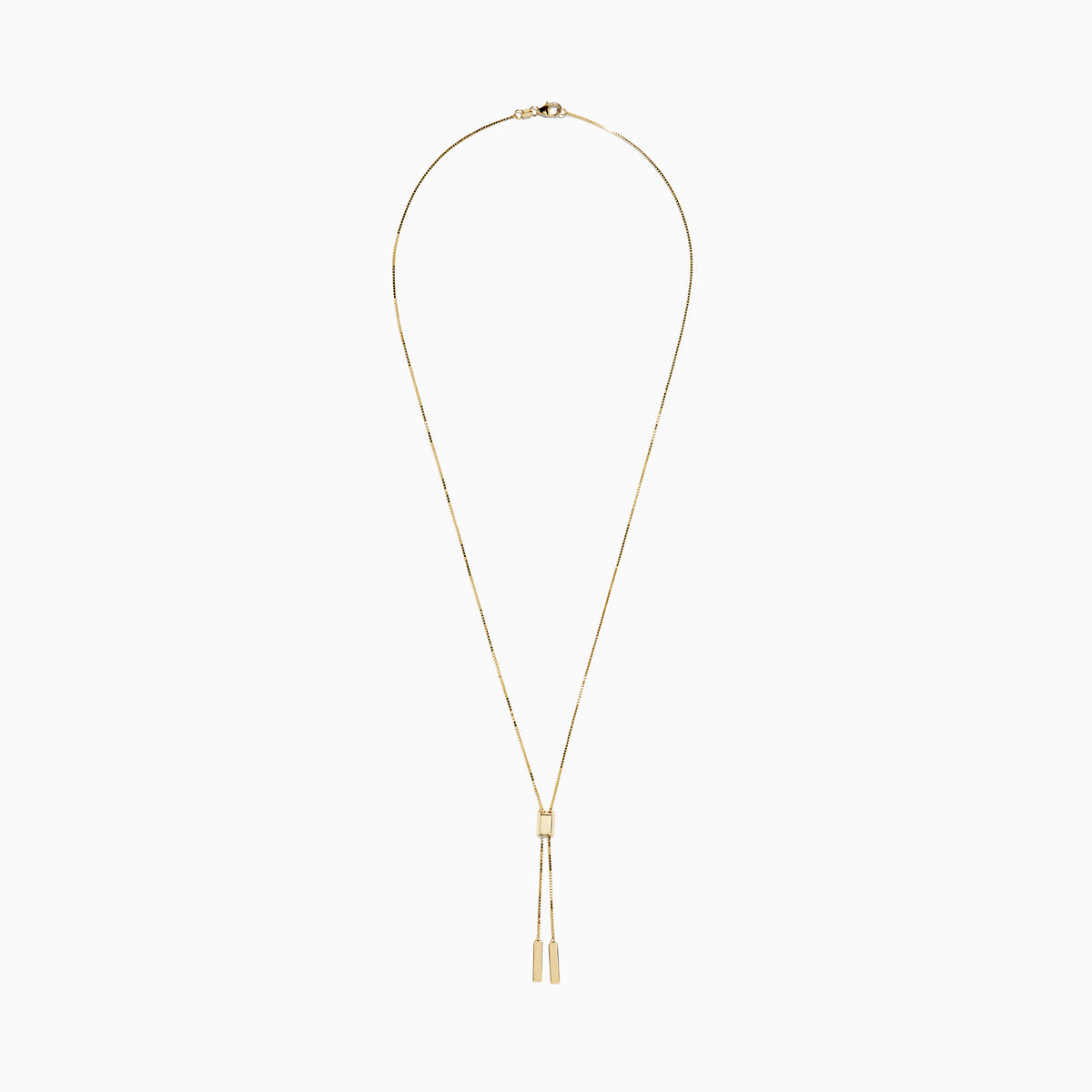 The 14K Yellow Gold Lariat Box Chain Necklace showcases a box-shaped slider at the center and two slender rectangular pendants on adjustable chains, all set against a plain white background.