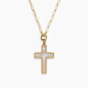 A 14K Yellow Gold Mother of Pearl Cross Pendant necklace featuring a cross outlined by small gold beads, displayed on a white background.