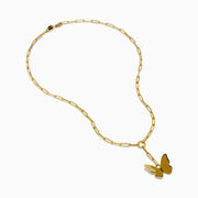 The 14K Yellow Gold Paperclip Butterfly Lariat Necklace features elongated chain links and a central ring with a gleaming butterfly pendant, displayed on a white background.