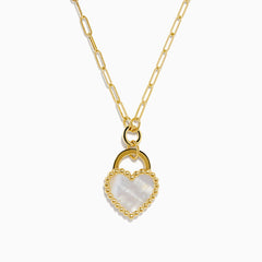 The 14K Yellow Gold Mother of Pearl Heart Pendant features a paperclip-style gold chain and a heart-shaped pendant with a pearly white center and beaded gold border.