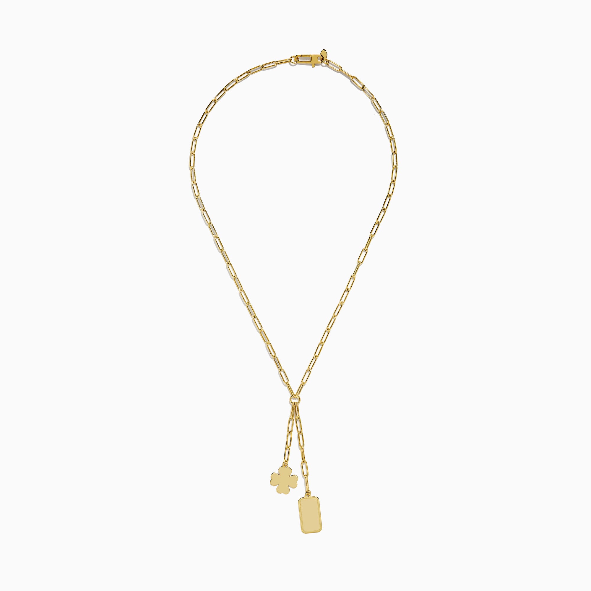 The 14K Yellow Gold Paperclip Dog Tag and Clover Lariat Necklace features elongated links with a four-leaf clover and rectangular tag charm side by side, crafted in 14K yellow gold and shown against a white background.