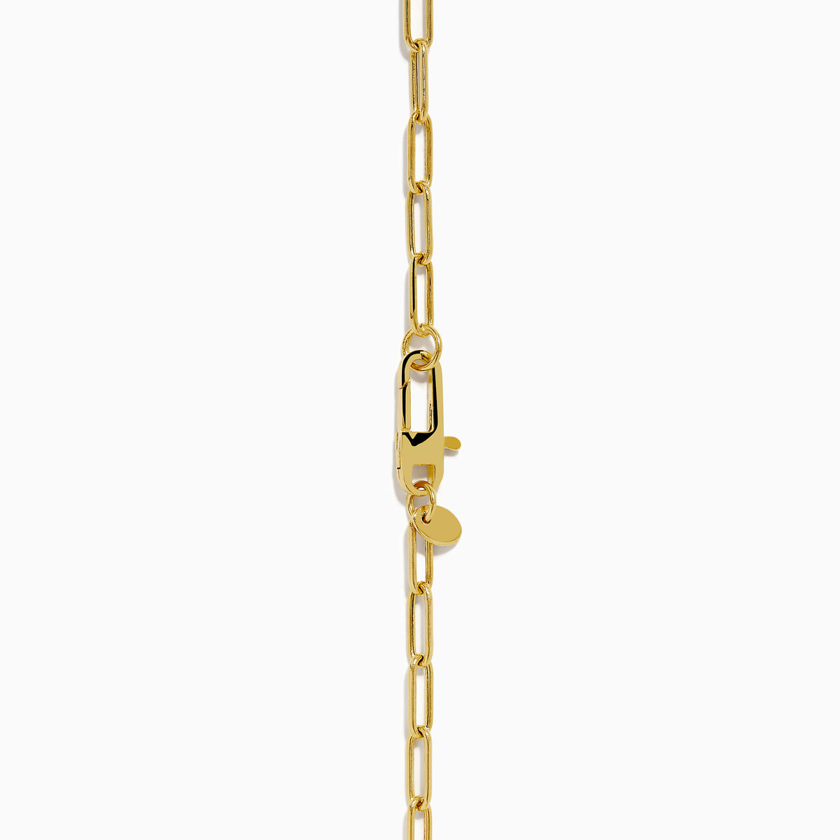 The 14K Yellow Gold Paperclip Dog Tag and Clover Lariat Necklace features elongated links with a four-leaf clover and rectangular tag charm side by side, crafted in 14K yellow gold and shown against a white background.