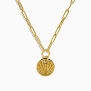 The 14K Yellow Gold Evil Eye Coin Pendant Paperclip Chain Necklace features a protective evil eye design with radiating lines, crafted in yellow gold for both style and symbolism, beautifully displayed on a plain white background.