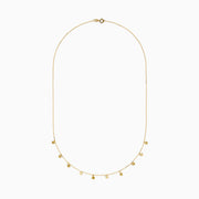 The 14K Yellow Gold Necklace with Star Charms on Chain features small stars spaced along a fine gold chain, presented on a plain white background.