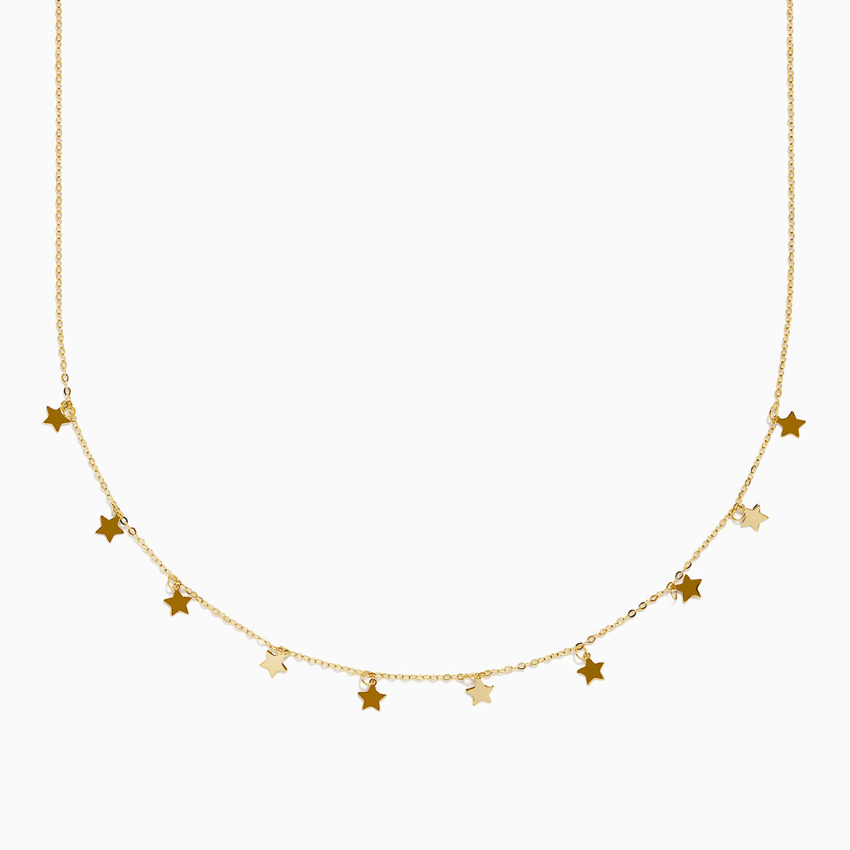 The 14K Yellow Gold Necklace with Star Charms on Chain features small stars spaced along a fine gold chain, presented on a plain white background.