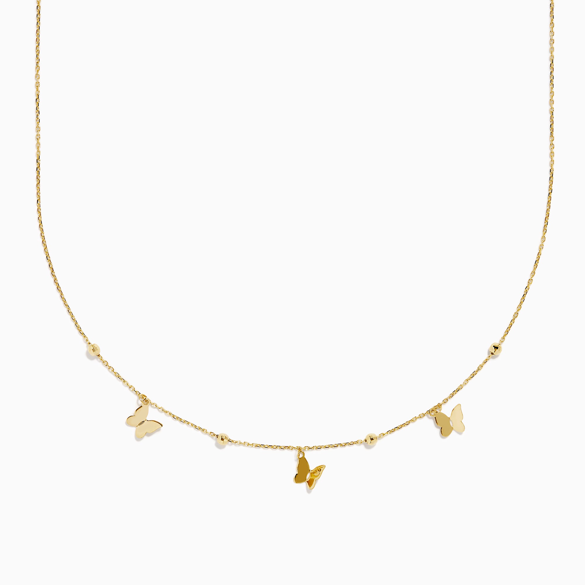 The 14K Yellow Gold Butterfly Station Necklace features three butterfly charms and four round beads evenly spaced along a delicate chain.