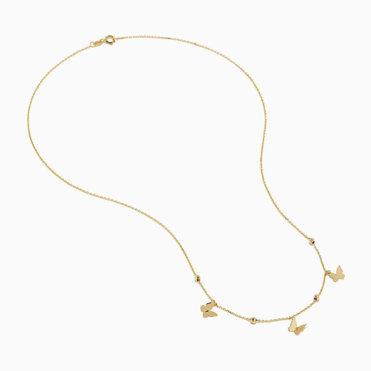 The 14K Yellow Gold Butterfly Station Necklace features three butterfly charms and four round beads evenly spaced along a delicate chain.