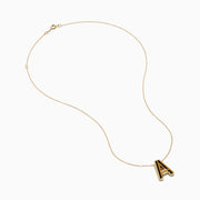 The 14K Yellow Gold Initial A Bubble Pendant is a gold chain necklace with a polished A pendant, shown on a plain white background.
